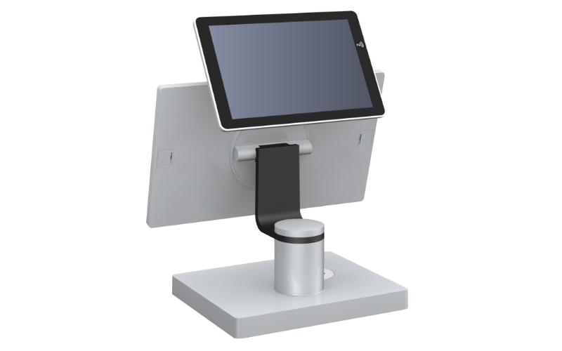 A modern silver and black touchscreen kiosk display stand with a tablet mounted on a cylindrical base, shown against a solid white background.
